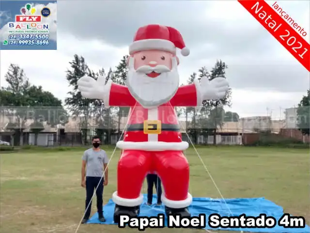 Papai Noel inflável gigante promocional sentado
